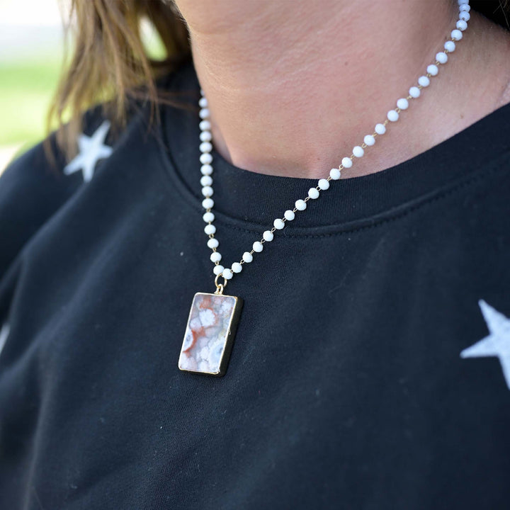 White Beaded Necklace with Stone Pendant